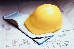 Blueprints and hard hat